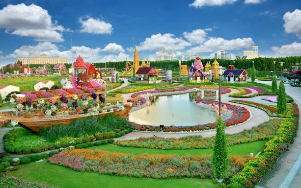 Dubai Miracle Garden with vibrant floral displays and colorful pathways.
