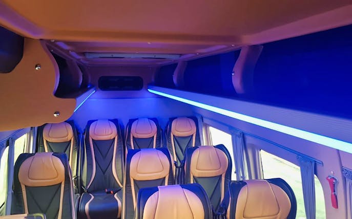 Interior of a luxury minivan for La Palmeraie private airport transfers from Marrakesh.