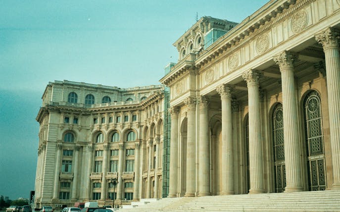 Parliament Palace in Bucharest with neoclassical columns, part of Communist City Tour.