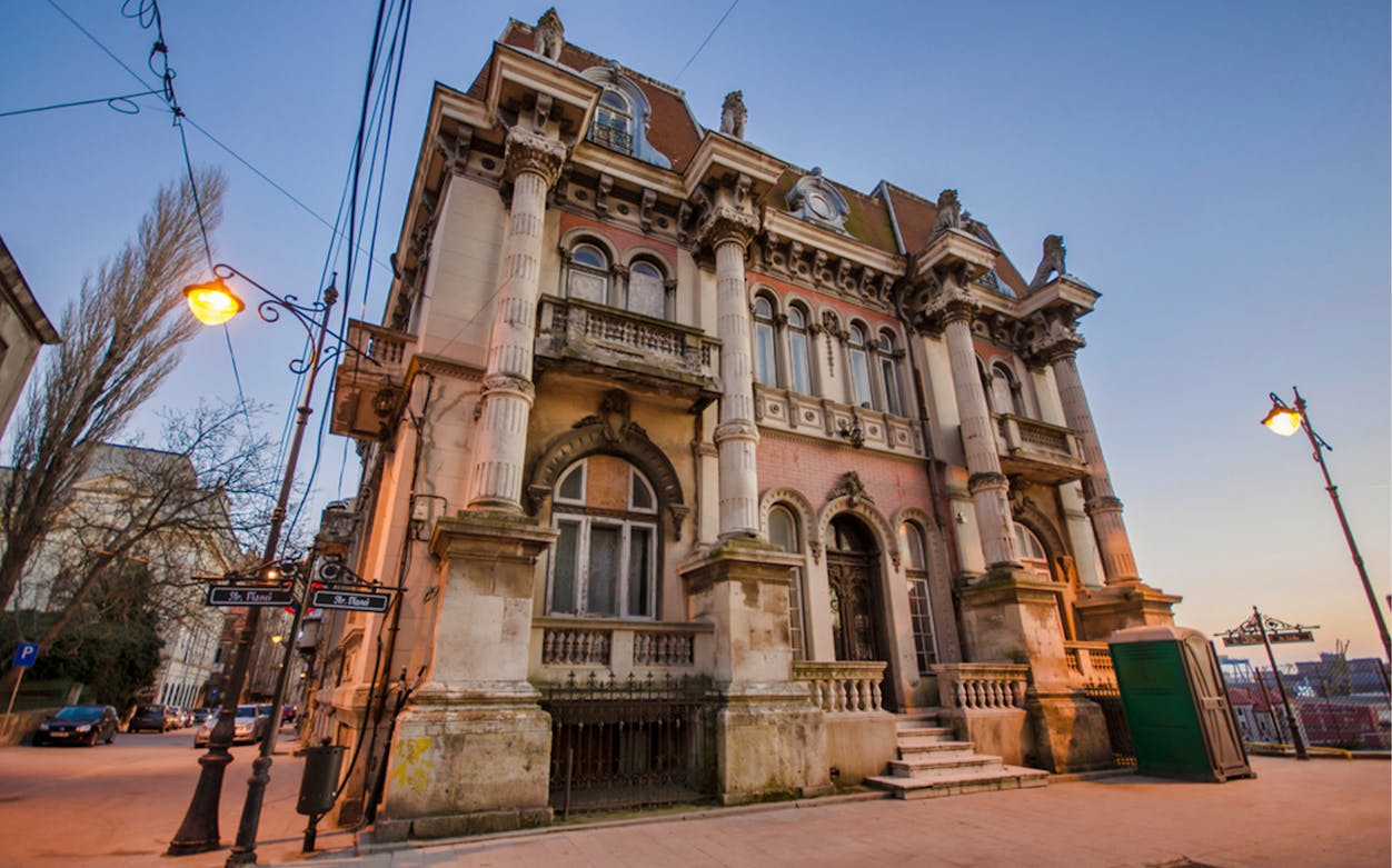Historic building in Constanța, Romania, near the Black Sea, part of a sightseeing tour.