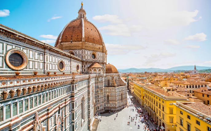 Florence Cathedral and cityscape on a sunny day, part of the Florence Unlimited Walking Tour Pass.