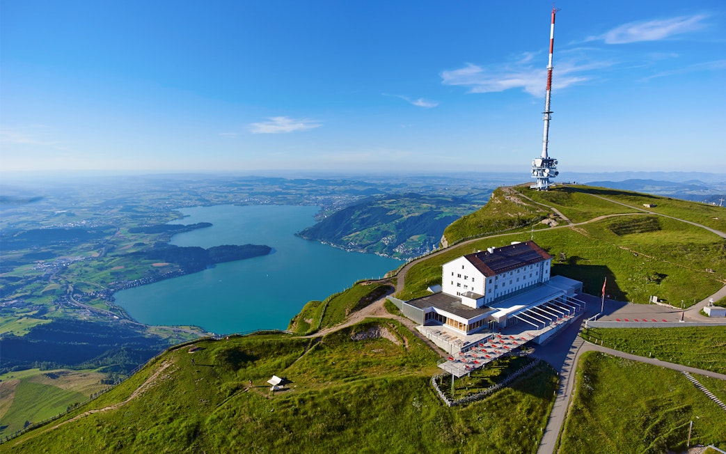 Mount Rigi summit with panoramic view of Lake Lucerne and surrounding landscape.