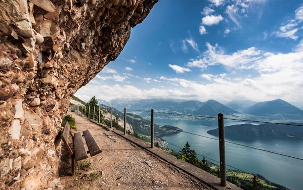 Pathway along Mount Rigi with view of Lake Lucerne and Swiss Alps.