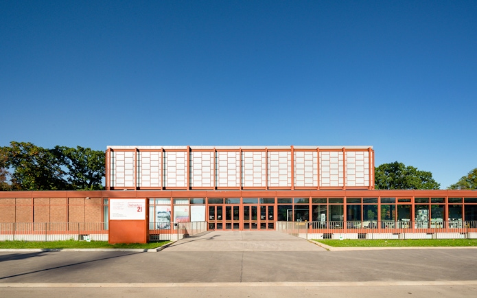 Belvedere 21 Museum entrance in Vienna under clear blue sky.
