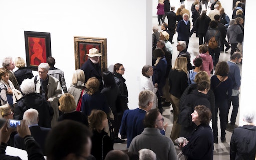 Visitors viewing modern art at Galleria Civica d'Arte Moderna e Contemporanea.