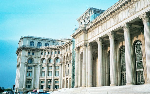 Palace of the Parliament in Bucharest, Romania, showcasing neoclassical architecture.