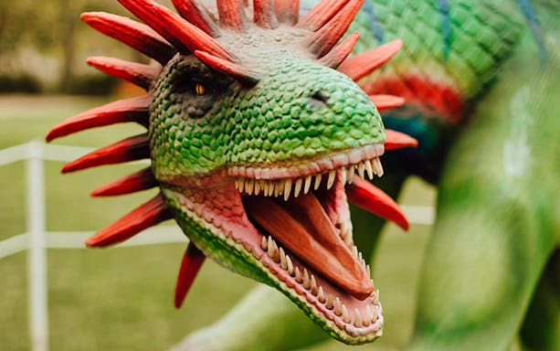 Dinosaur sculpture with red spikes at Mega Creatures Event, Hunter Valley Gardens.