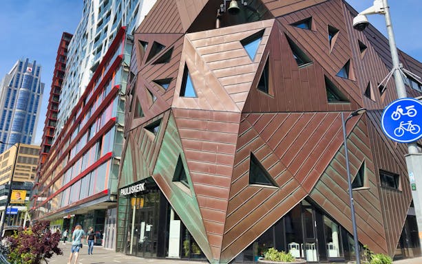 Rotterdam modern architecture with geometric facade on walking tour route.