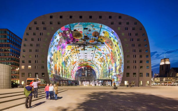 Markthal Rotterdam exterior with colorful archway, part of the Markthal Tour & Rooftop Oldest Skyscraper.