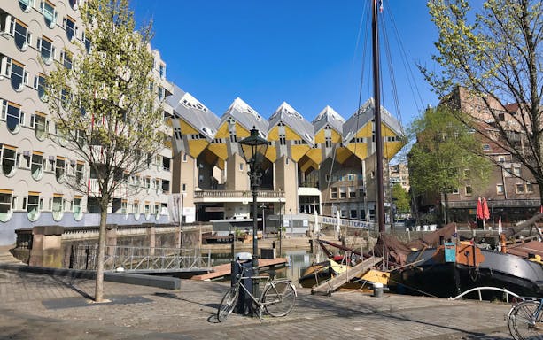 Cube houses and canal view in Rotterdam during Markthal tour.