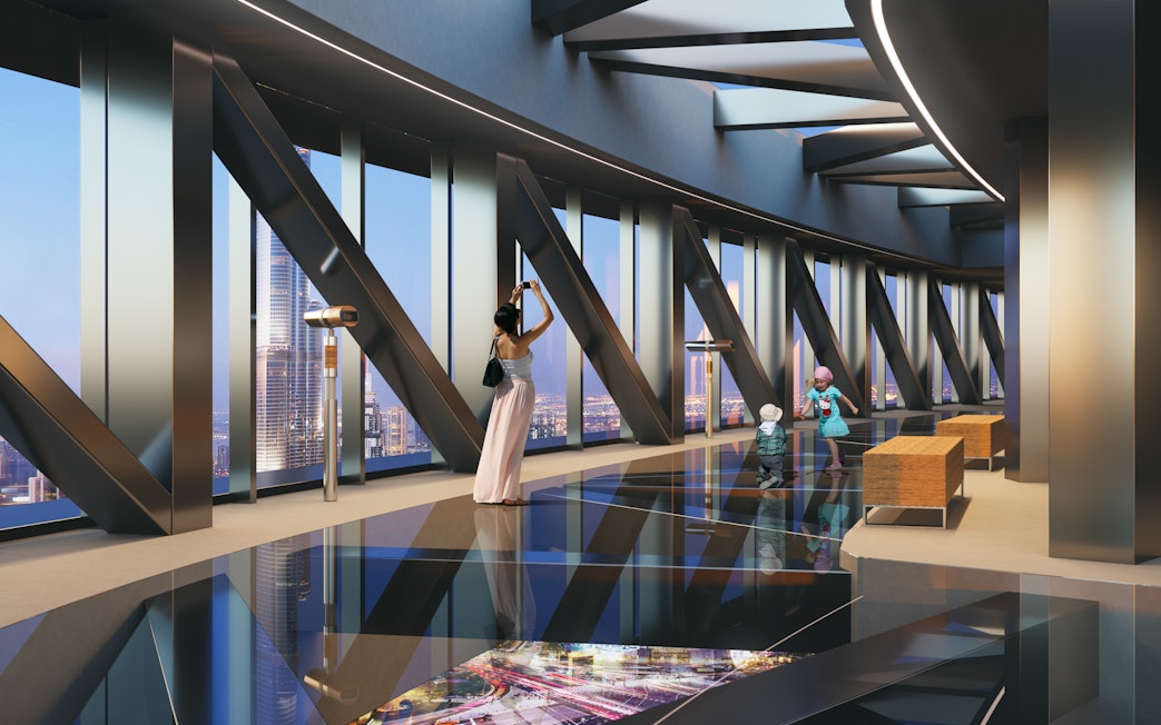 Family enjoying views at Sky Views Observatory, Dubai.