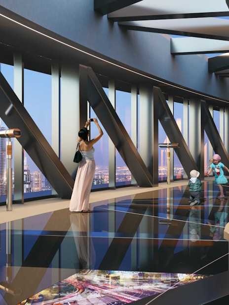 Family enjoying views at Sky Views Observatory, Dubai.