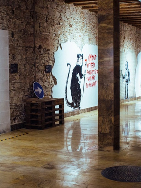 Street art exhibits at Banksy Museum Barcelona.