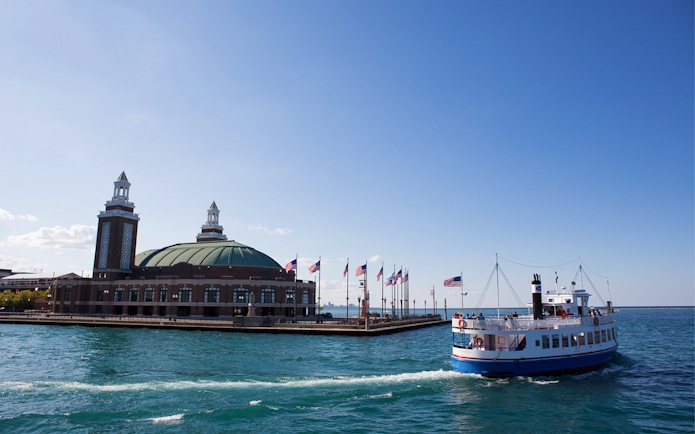 Tour boat near Chicago's Navy Pier on a sunny day during the Chicago Skyline Lake Tour.
