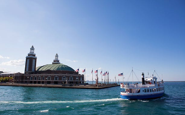 Tour boat near Chicago's Navy Pier on a sunny day during the Chicago Skyline Lake Tour.
