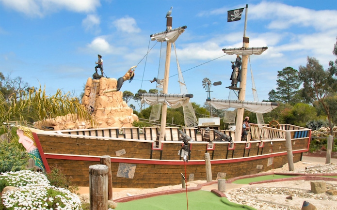 Pirate-themed playground with ship and figures at Maru Koala and Animal Park.