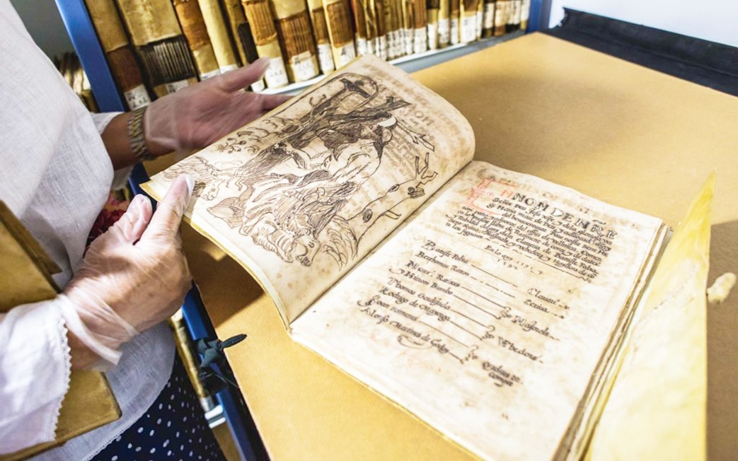 Historic manuscript at Valencia's Silk Museum, part of the Valencia Pass tour.