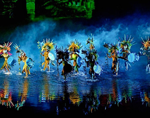 Puy du Fou España night show with performers in historical costumes, Madrid, Spain.