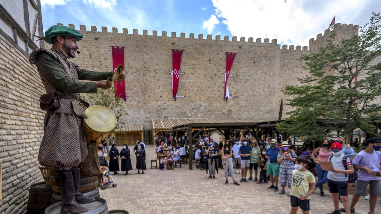 Puy du Fou España entrance with visitors gathering for El Sueño de Toledo night show in Madrid.