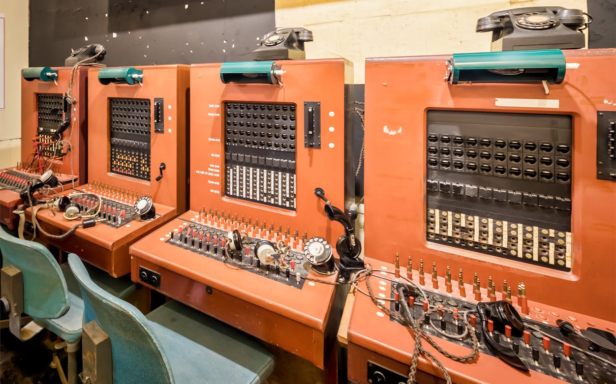 Switchboard room at Liverpool War Museum, Western Approaches, featuring vintage communication equipment.