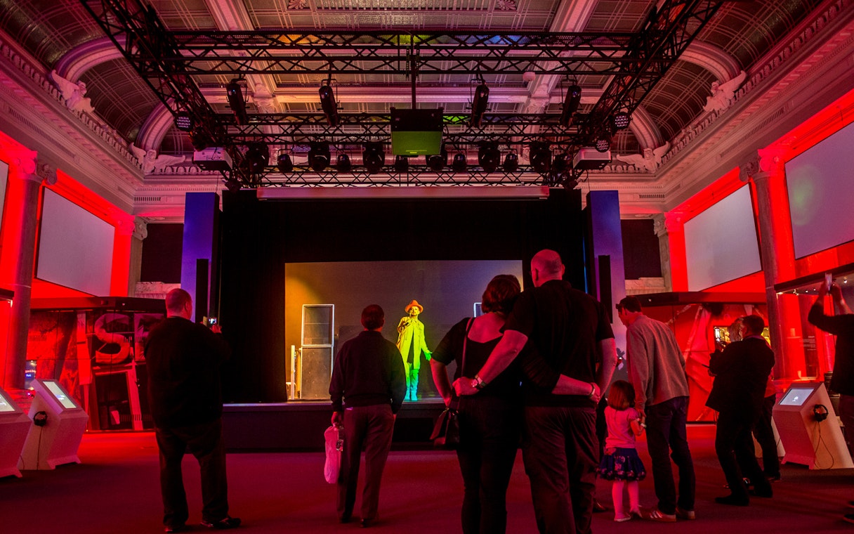 Visitors watching a music performance at the British Music Experience in London.