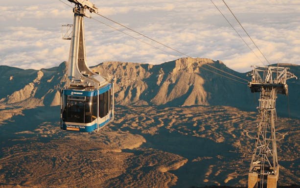 Cable car ascending Teide Crater with mountain landscape in Tenerife.