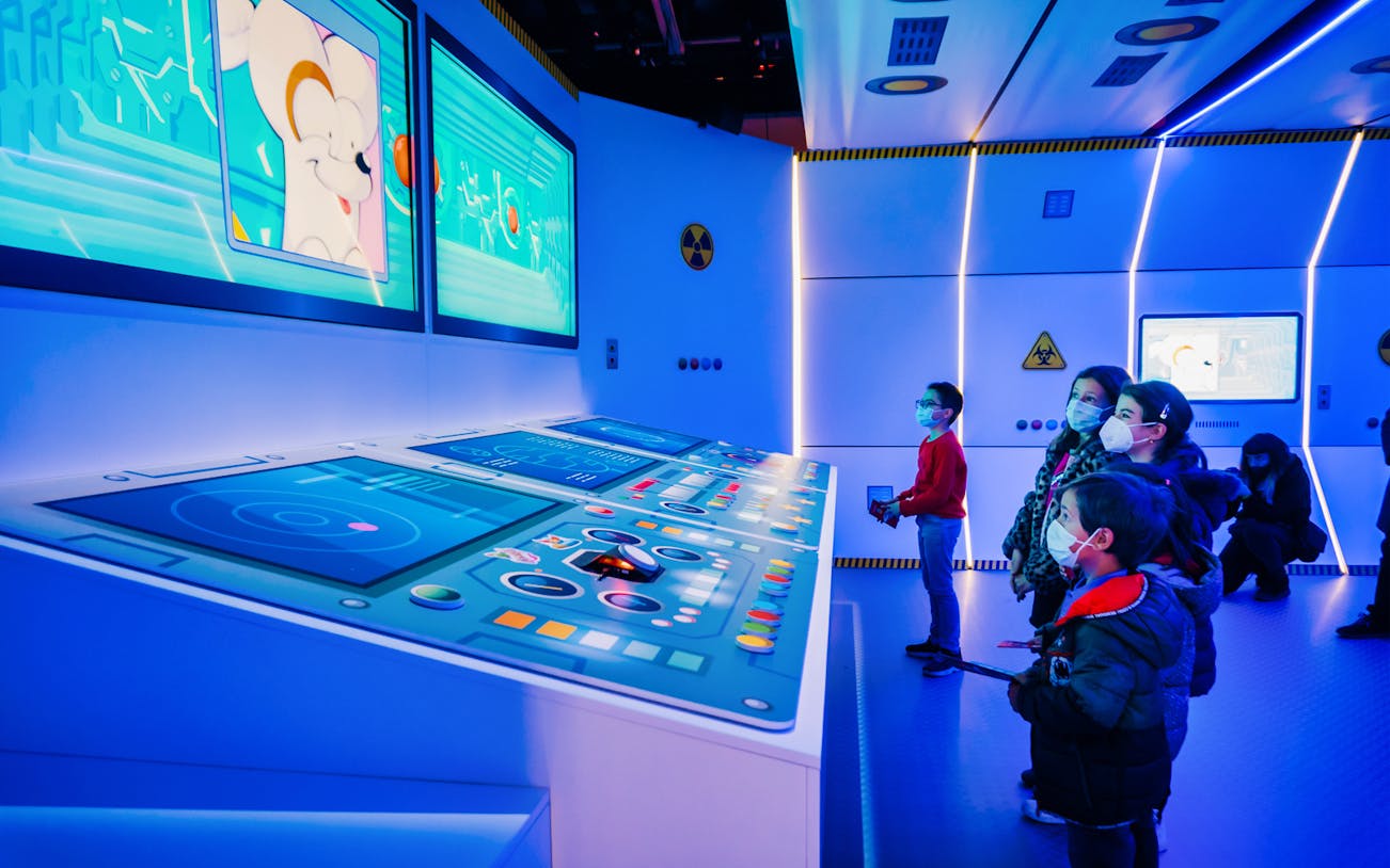Children exploring interactive displays at SuperThings: The Exhibition.