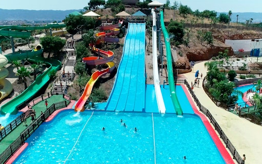 Water slides and pool at Terra Natura Murcia entrance.
