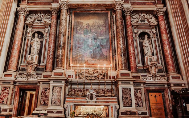 Naples Old Town Centre tour featuring ornate church interior with statues and artwork.