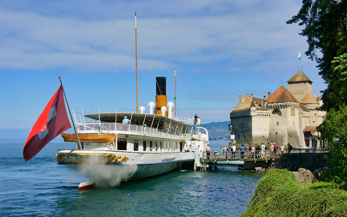 Steamboat docked near Chillon Castle on Lake Geneva, Switzerland.