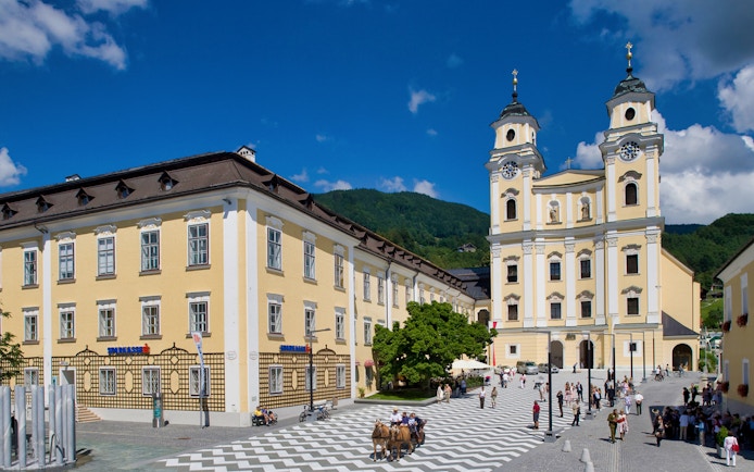 Mondsee Basilica with tourists, part of the Original Sound of Music Tour from Salzburg.