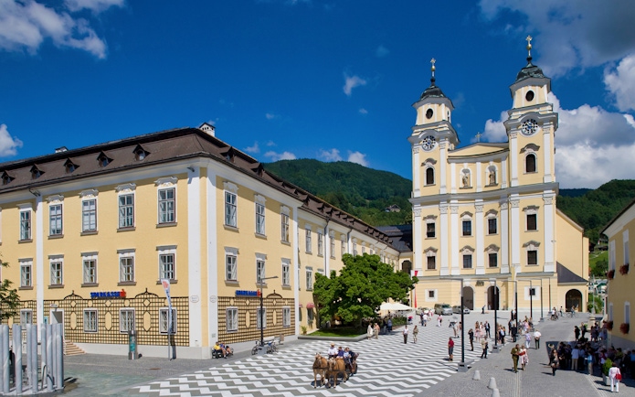 Mondsee Basilica with tourists, part of the Original Sound of Music Tour from Salzburg.