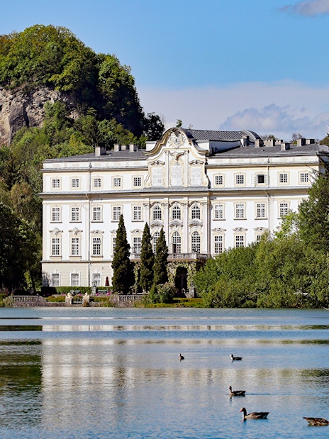 Schloss Leopoldskron by a lake in Salzburg, featured in the Sound of Music tour.