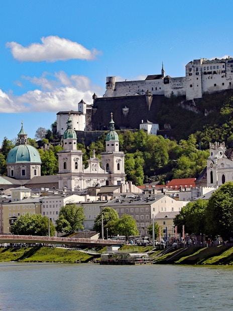 Salzburg skyline with Hohensalzburg Fortress and Salzach River, Austria.
