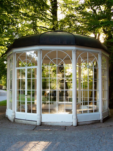Gazebo from The Sound of Music in Salzburg, surrounded by trees.