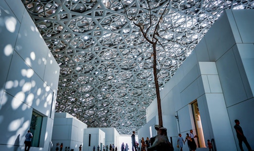 Louvre Abu Dhabi exterior with modern architecture, part of Combo: Louvre Abu Dhabi + Qasr Al Watan Tickets.