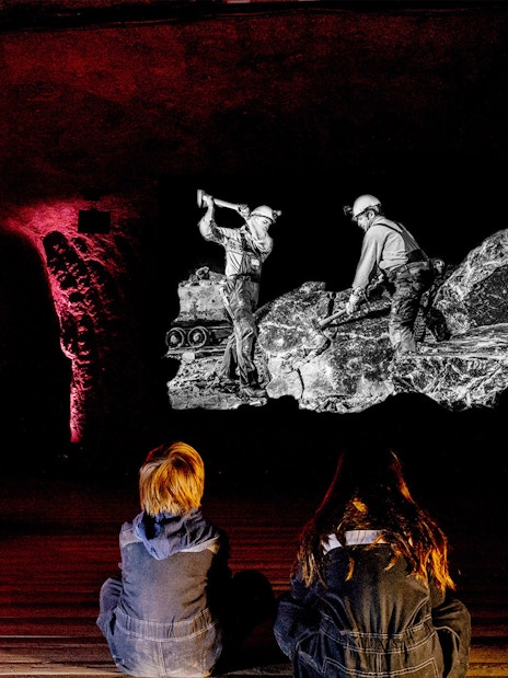 Children observing a salt mine exhibit in Berchtesgaden during Bavarian Salt Mine Tour from Salzburg.