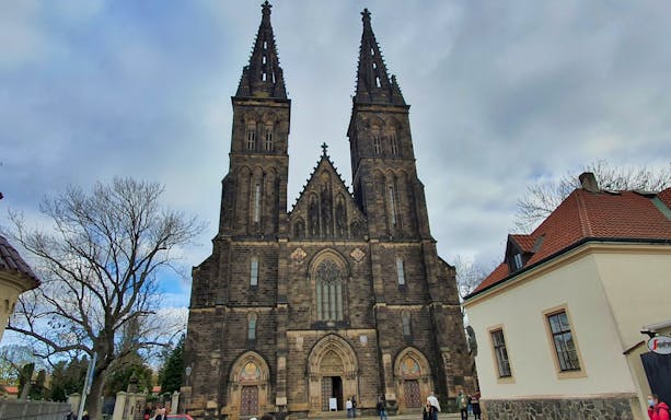 Vyšehrad Fort entrance with twin spires in Prague, Czech Republic.