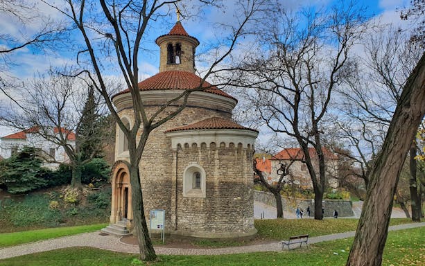 Vyšehrad Fort's Rotunda of St. Martin surrounded by trees in Prague.