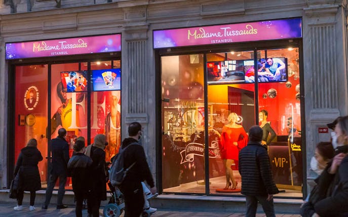 Madame Tussauds Istanbul entrance with visitors outside.