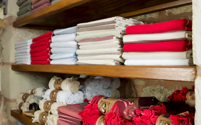 Folded towels on shelves in a Turkish hammam in Istanbul.