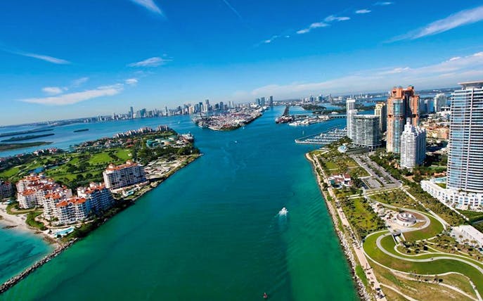 Aerial view of Miami skyline and bay, highlighting cruise route for Miami Movie Tour.