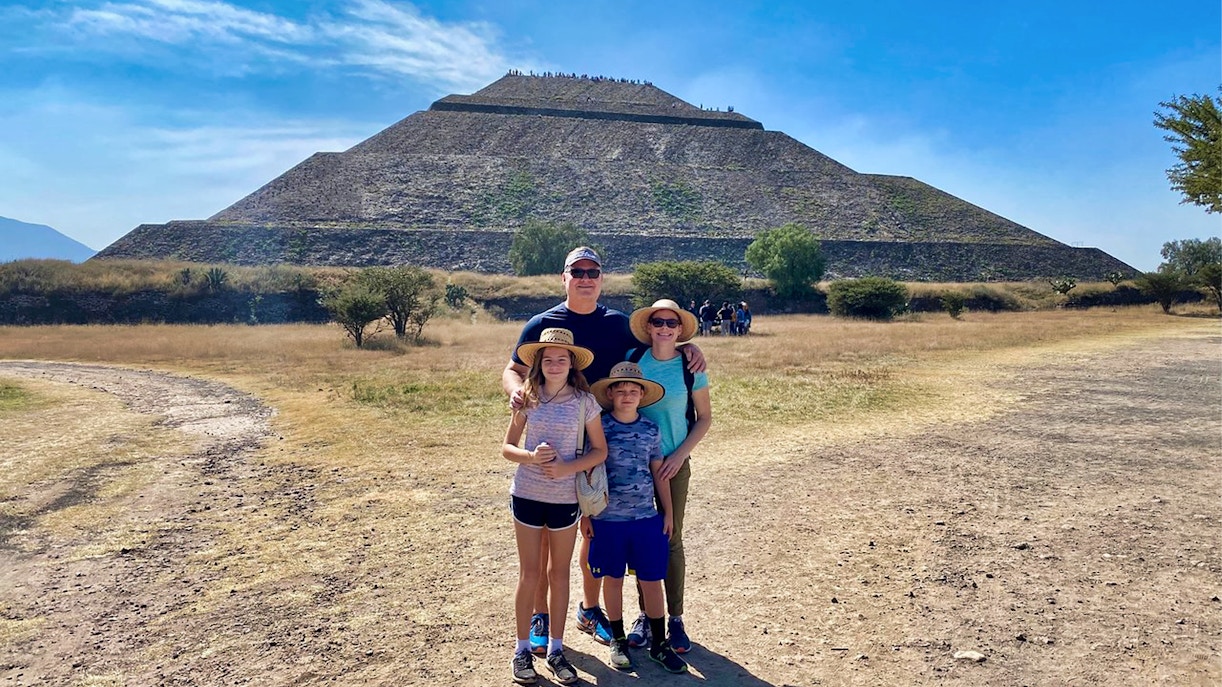 Family in front of Pyramid of the Sun, Teotihuacan, during private tour.