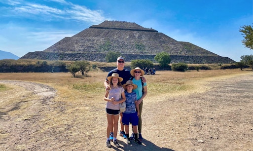 Family in front of Pyramid of the Sun, Teotihuacan, during private tour.