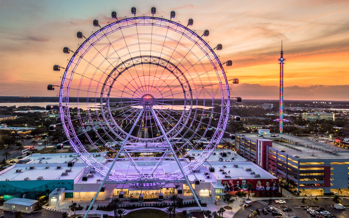 Ferris wheel at ICON Park in Orlando during sunset.