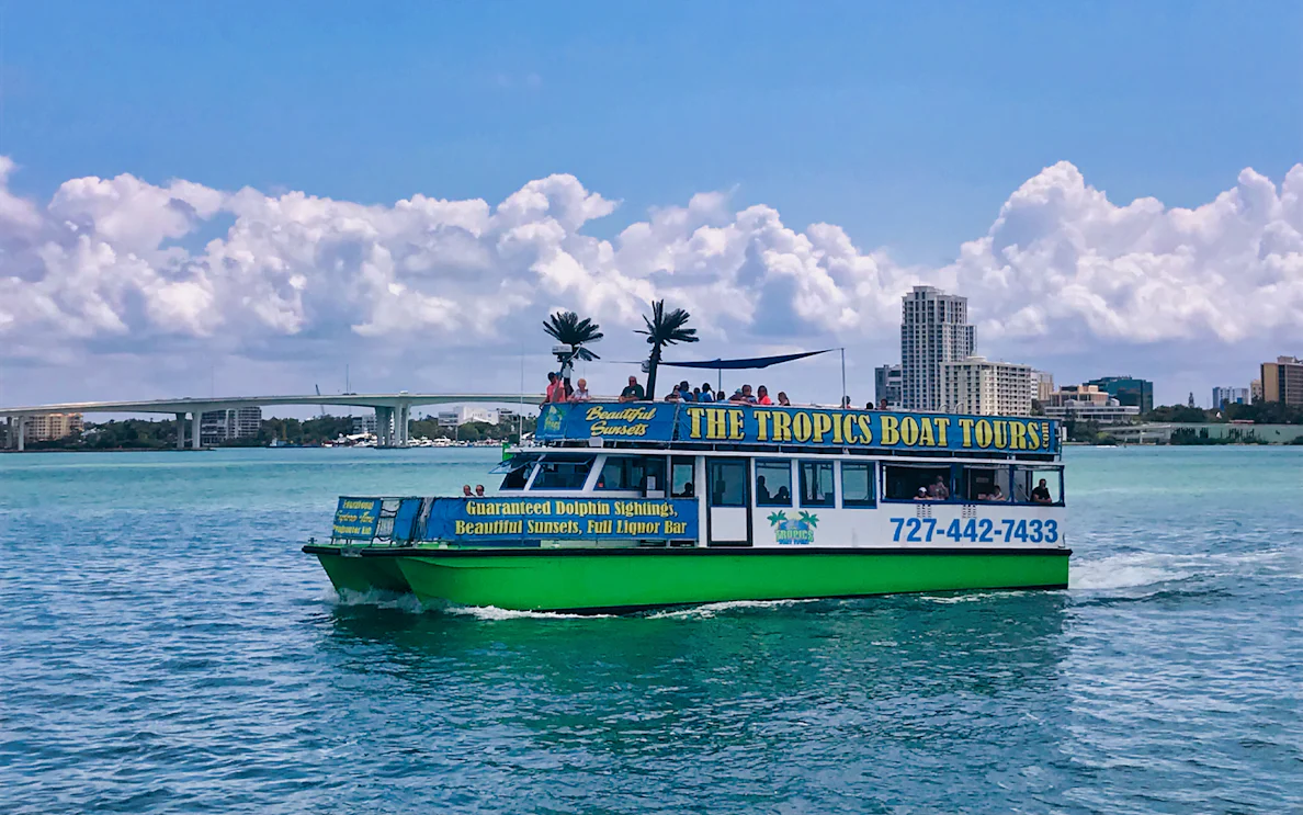 Tour boat on Clearwater Beach offering dolphin sightings and sunset views.