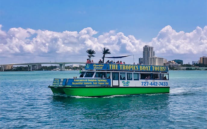 Tour boat on Clearwater Beach offering dolphin sightings and sunset views.