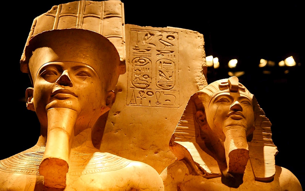 Ancient Egyptian statues with hieroglyphs at the Egyptian Museum.