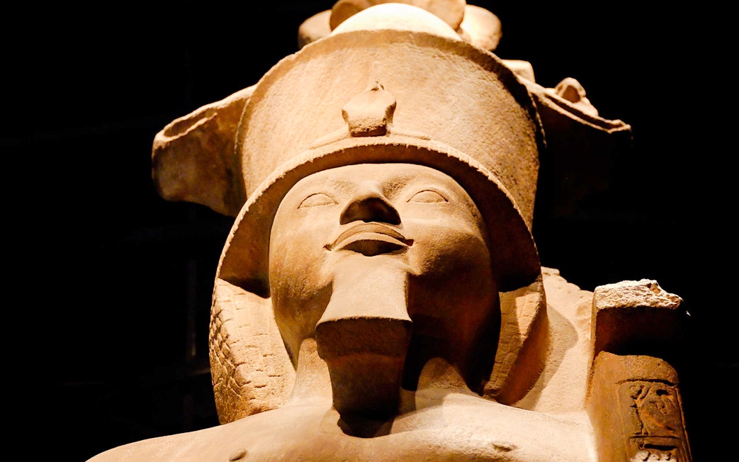 Ancient Egyptian statue at the Egyptian Museum, Cairo, featured in skip-the-line guided tour.