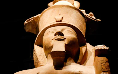 Ancient Egyptian statue at the Egyptian Museum, Cairo, featured in skip-the-line guided tour.